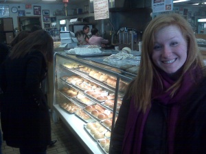 Chenault, in front of the pastries at Chiu Quon.